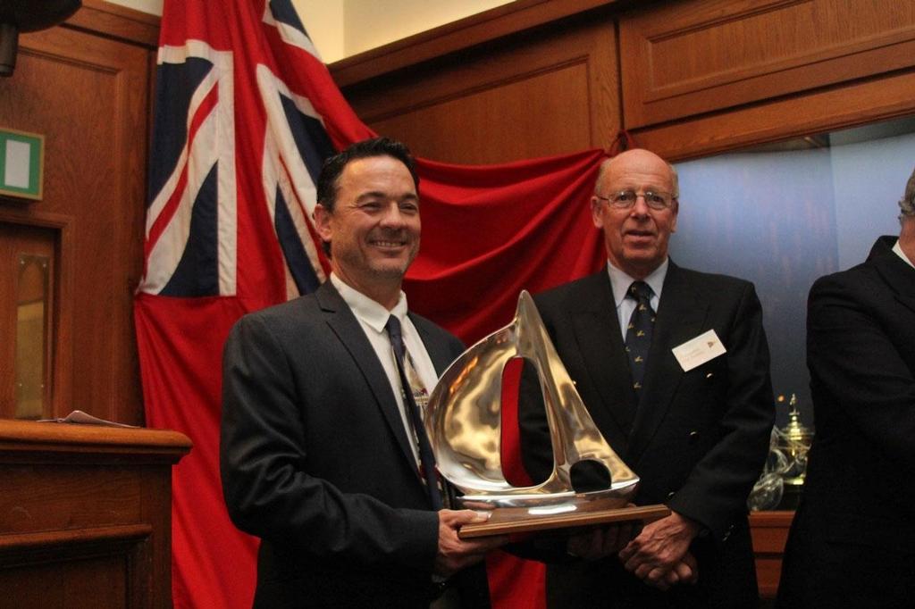 Dan Alonso holding the OCC Seamanship Award, presented for the first time in the 60th Anniversary  Year at the Annual Awards Dinner by Commodore John Franklin (right) ©  Ocean Cruising Club